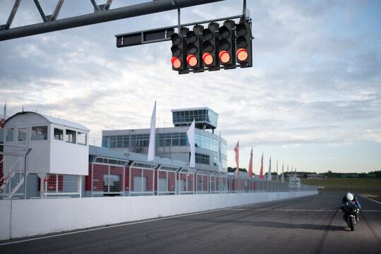 Motorcycle racer man on start position