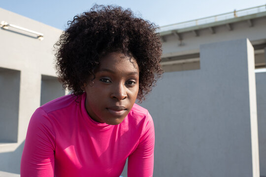 Black sportswoman looking at camera