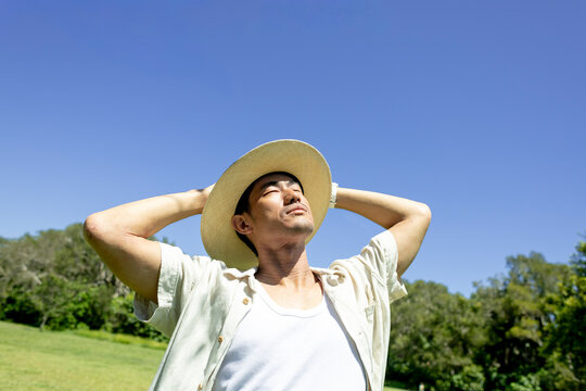 Man Relaxing Sunny Field