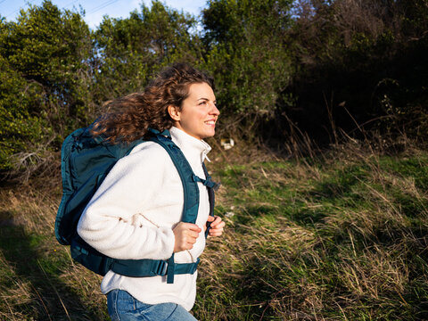 Woman hiking enjoying nature during an outdoor adventure