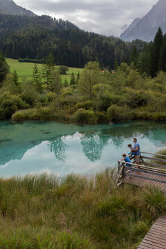 Family explores nature in Slovenia, Sava Dolinka river, Kranjska Gora
