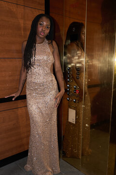 Woman standing in an elevator