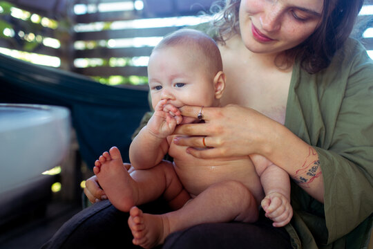 mother and child resting on the terrace