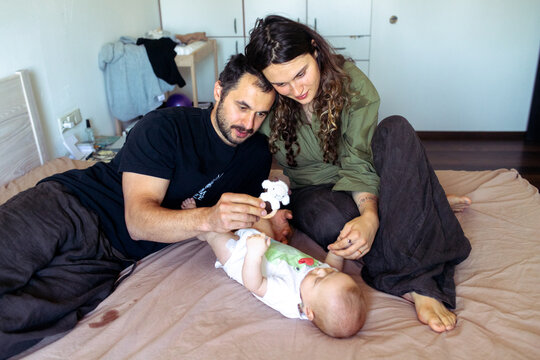 family relaxing in the room