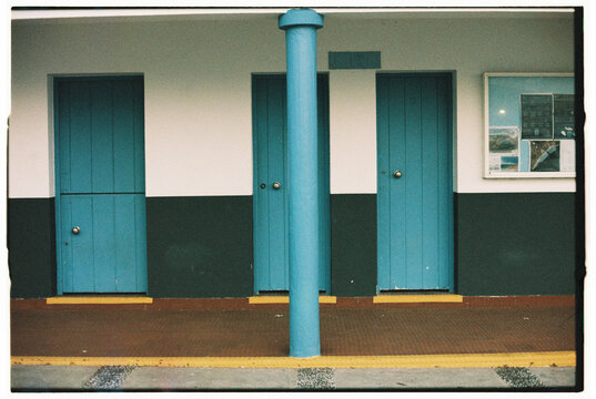 Blue doors and column on seaside building in Madeira