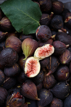 Fresh Figs on a Table With Cut Fruit Showing Inside