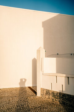 Shadow on a White Wall at a Quiet Location During Daytime