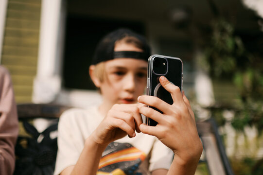 little boy using smartphone 
