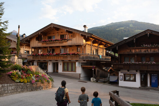 Family visiting a Mountain Village in Tyrol, Austria, during travel