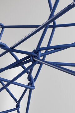 Geometric network of connected blue tubes