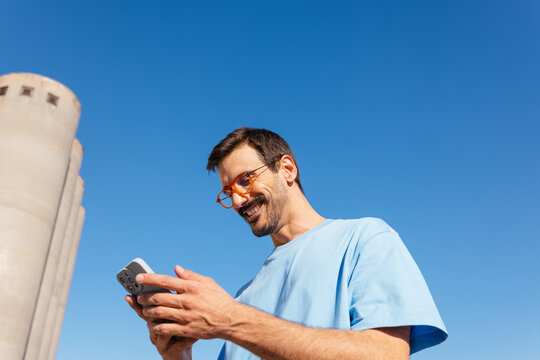 Smiling phone user