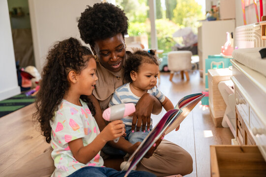 Family reading time in cozy living room