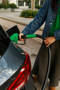 Refueling Car at Gas Station 