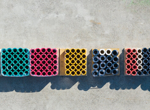 Top View of Colorful Industrial Cable Spools on Pallets