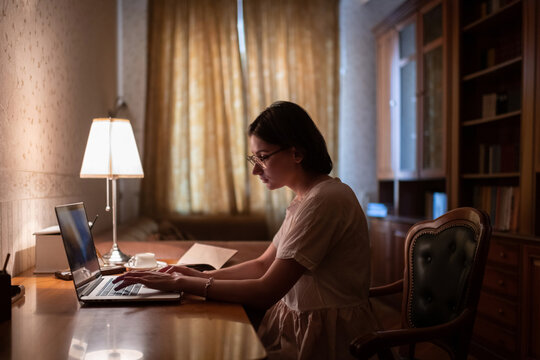 Young woman studying at home