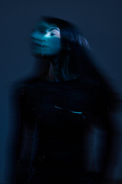 Movement of a person in blue light at night
