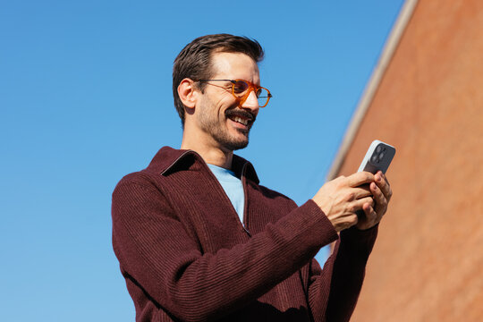 Cheerful phone user