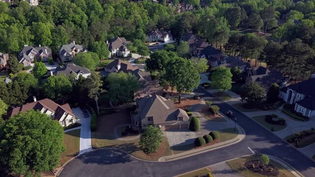 4k hyper lapse aerial video of flying over an upscale subdivision in suburbs of USA