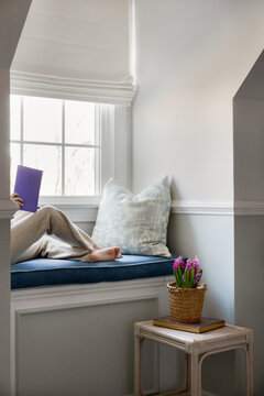 Girl reading in her nook