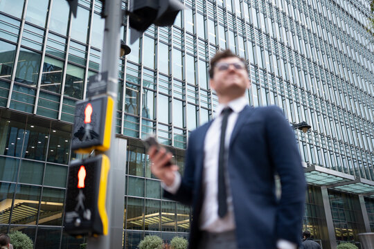 Businessman checking smartphone