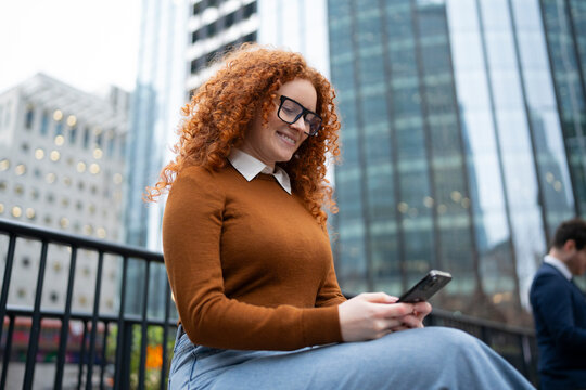 Business Woman Using Smartphone