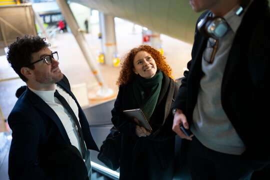 Business meeting at transport hub
