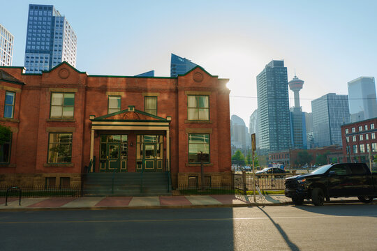 Historic building on the background of modern skyline in Calgary 