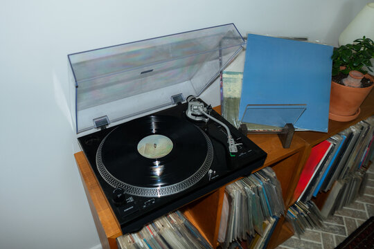 Blue album near turntable (copyspace) 