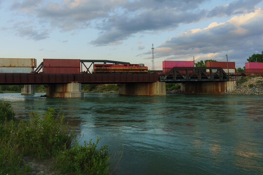 Freight train on the bridge across Bow River in Calgary