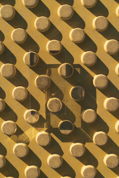 Glass Prism Casting Shadow Over Yellow Tactile Paving Pattern