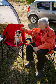 Woman with a pug.