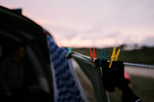 towel and socks on an improvised laundry hanging from tent