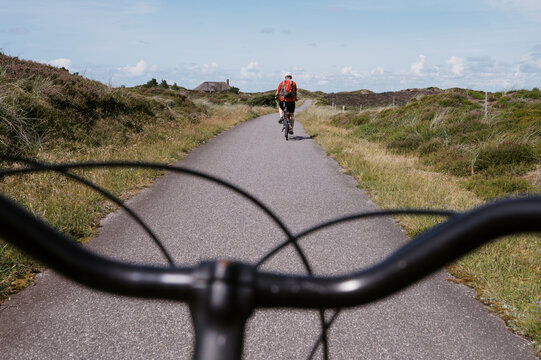 pov ugc of biking along coastline in b&oslash;rsmose denmark