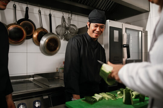 Chef In Training Preparing Fresh Vegetables In Kitchen