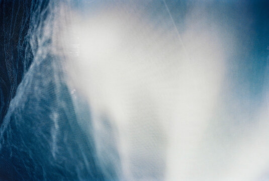 Abstract Shape Texture Of Light Delicate Fabric Close-Up