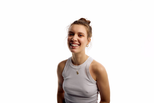 Woman smiles in studio