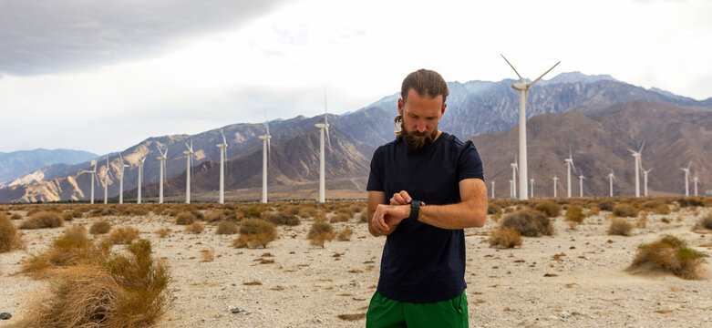 Fit trail runner Portrait look at Smart Watch panoramic 