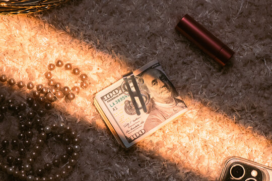 Luxury Flat Lay with Hundred Dollar Bills and Pearl Jewelry