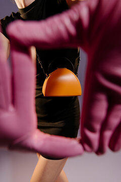Orange Mini Handbag On Model In Black Dress