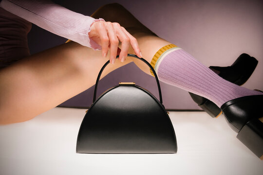 Elegant Black Handbag With Pastel Socks
