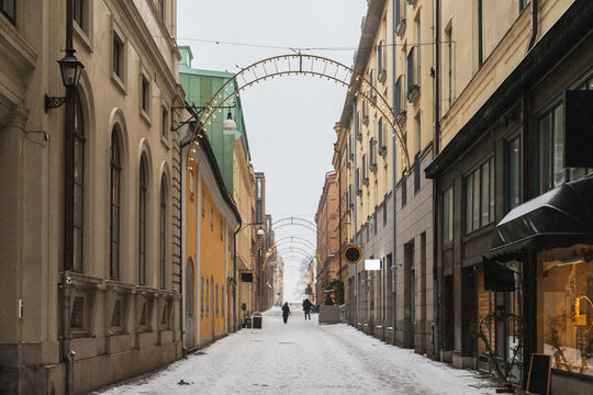 Traditional Scandinavian Architecture on a Snow-Covered City Street