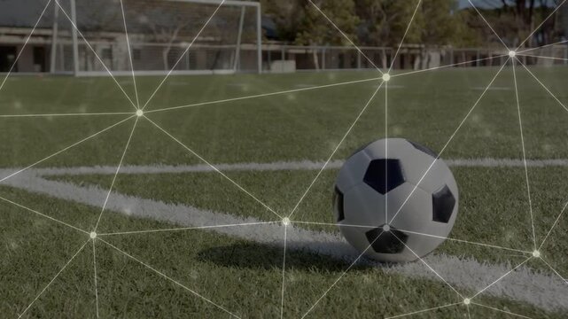 Camera pullback revealing soccer ball rolling along curve, sports overlay tracking roll toward goal
