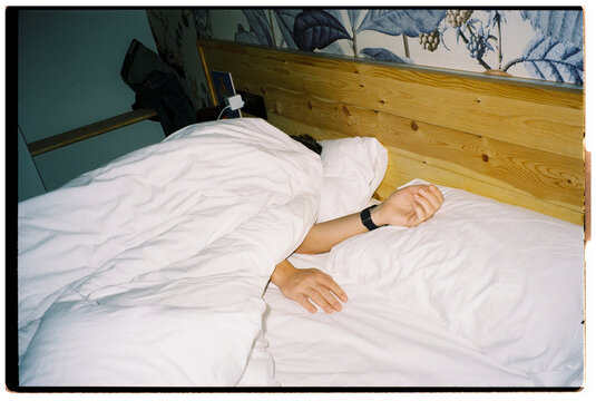 Person Asleep in Bed