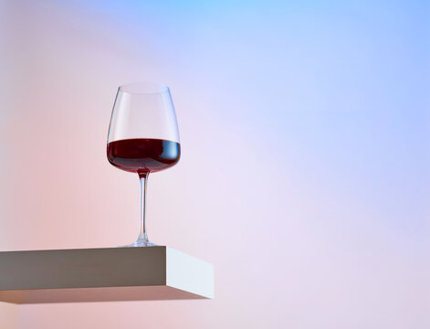 Single Glass of Red Wine on Levitated Surface 