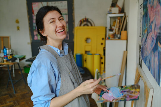 Portrait of a happy woman by the artist