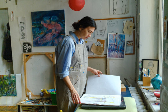 portrait of a female artist in her studio