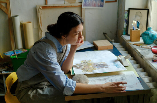 portrait of a female artist in her studio