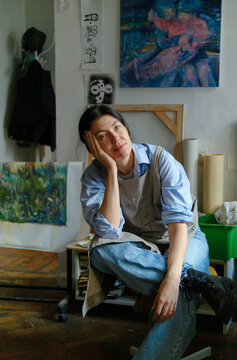 portrait of a female artist in her studio