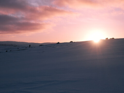 Wilderness Backcountry Skiing During Winter Sunrise