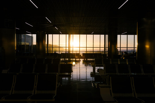 Airport waiting room illuminated by sunlight